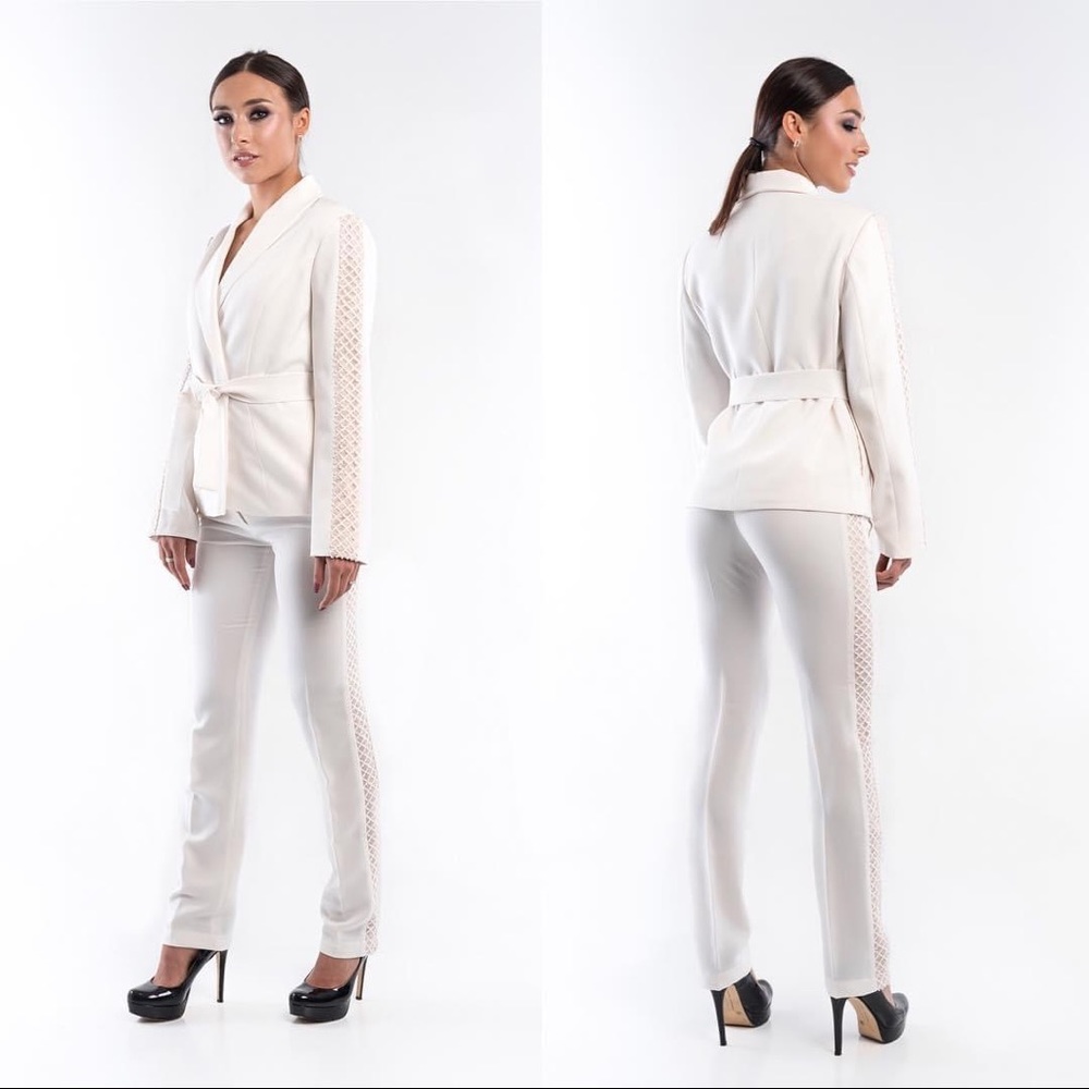 Woman’s designers white suit